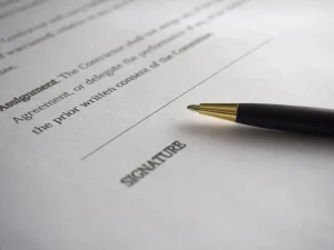 pen on agreement paper